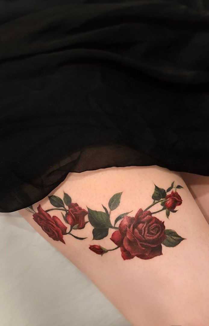 Rose tattoos for girls on thigh