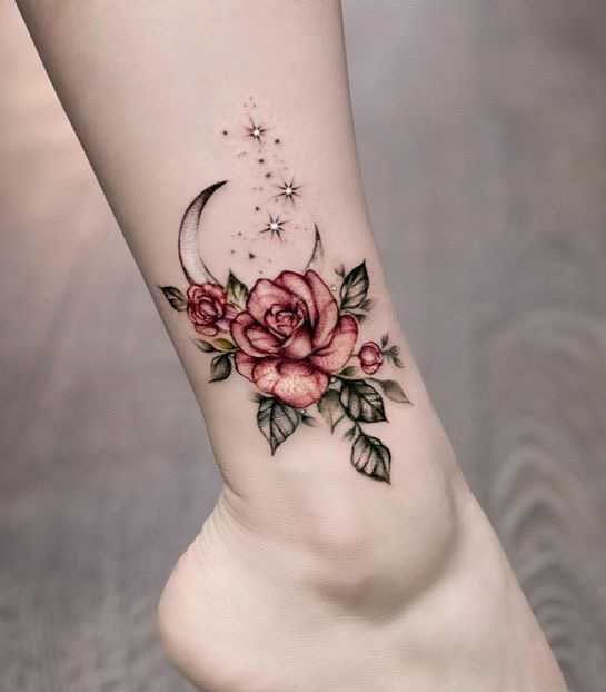 rose tattoo design with moon on leg