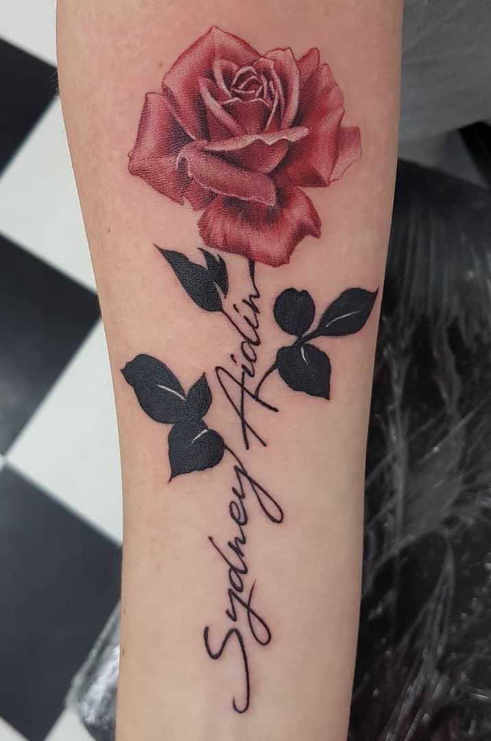 rose tattoo with leaves and quotes