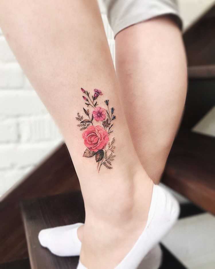 beautiful rose tattoo for legs