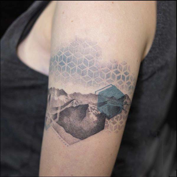 mountain armband tattoo on bicep