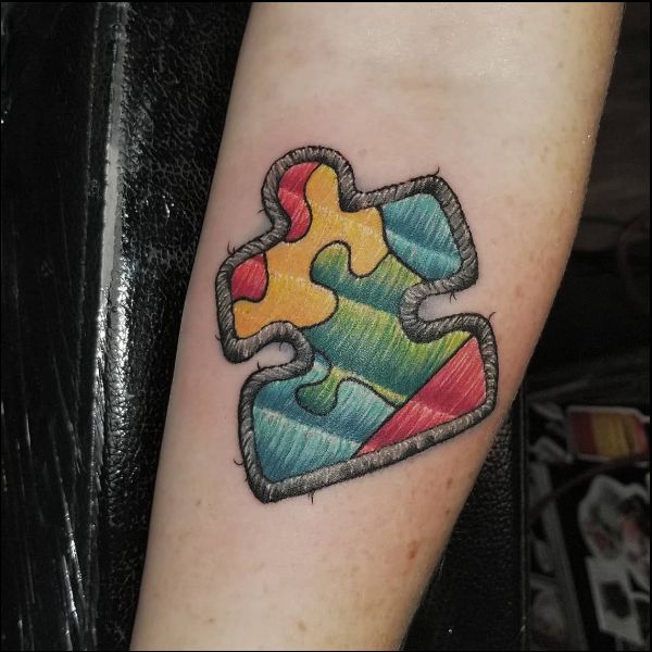 autism awareness puzzle piece bear tattoo