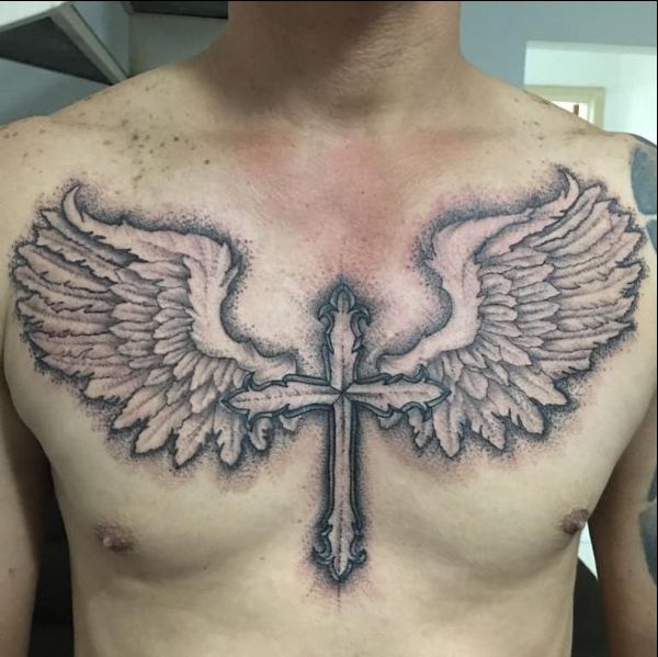 chest cross tattoo