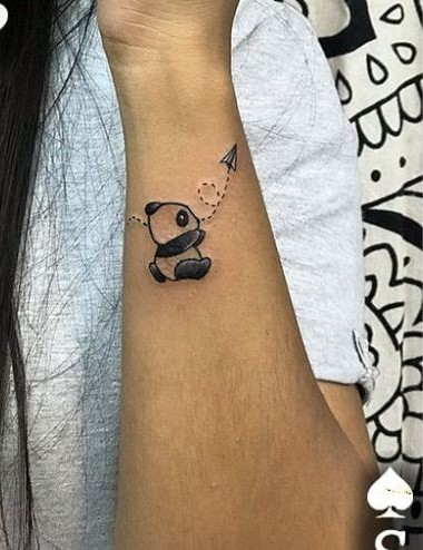 small panda tattoos on wrist