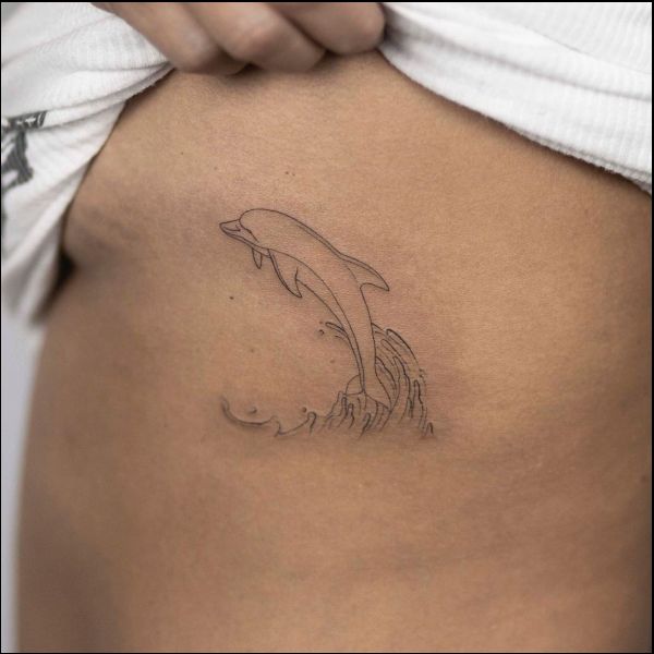 dolphin tattoos on ribs