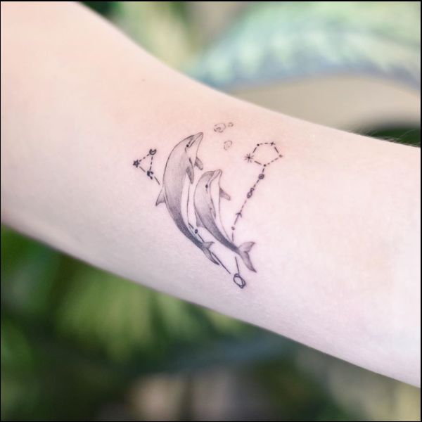dolphin hand tattoos