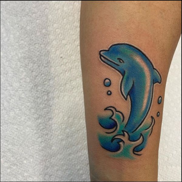 dolphin tattoos for upper arm