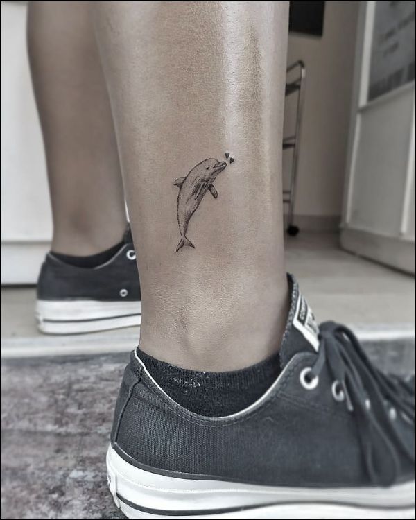 dolphin tattoos on leg