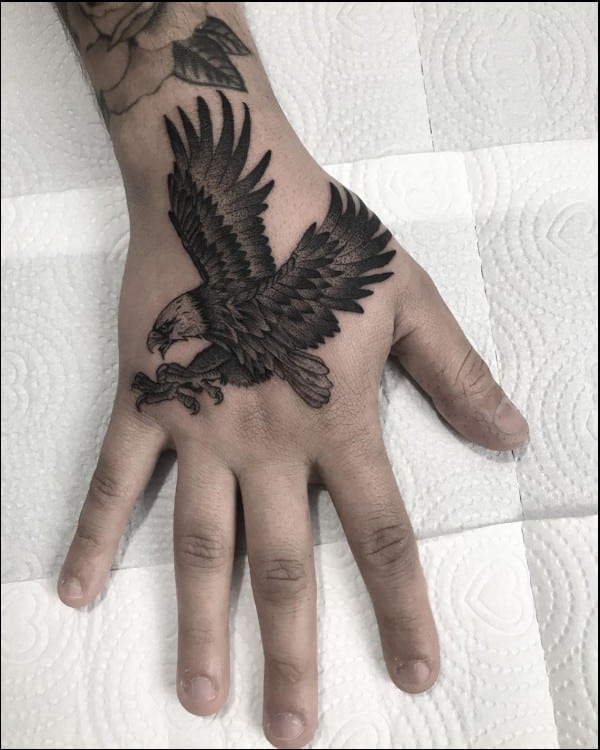 Small eagle tattoo on hand