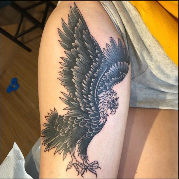 Eagle tattoos on thigh