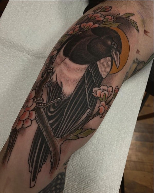 bird forearm tattoo
