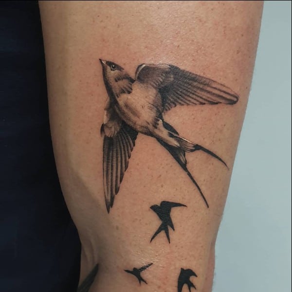 simple bird tattoo