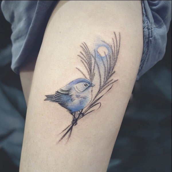feather with birds tattoo meaning
