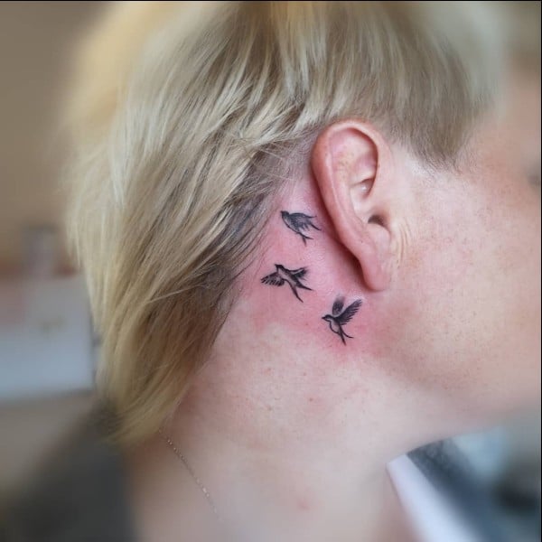 bird neck tattoo