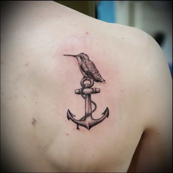 back tattoo with anchor and birds