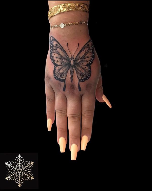 butterfly hand tattoos
