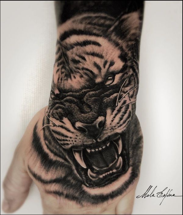 tiger hand tattoos