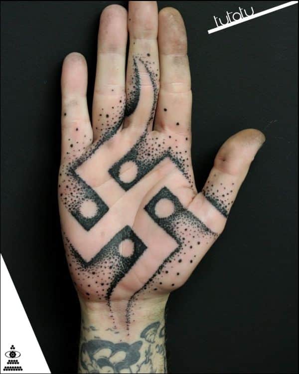 swastikas' tattoos on palm