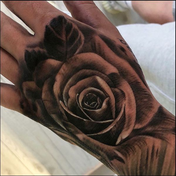 hand rose tattoos