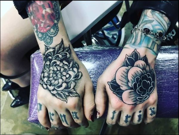 matching hand tattoos