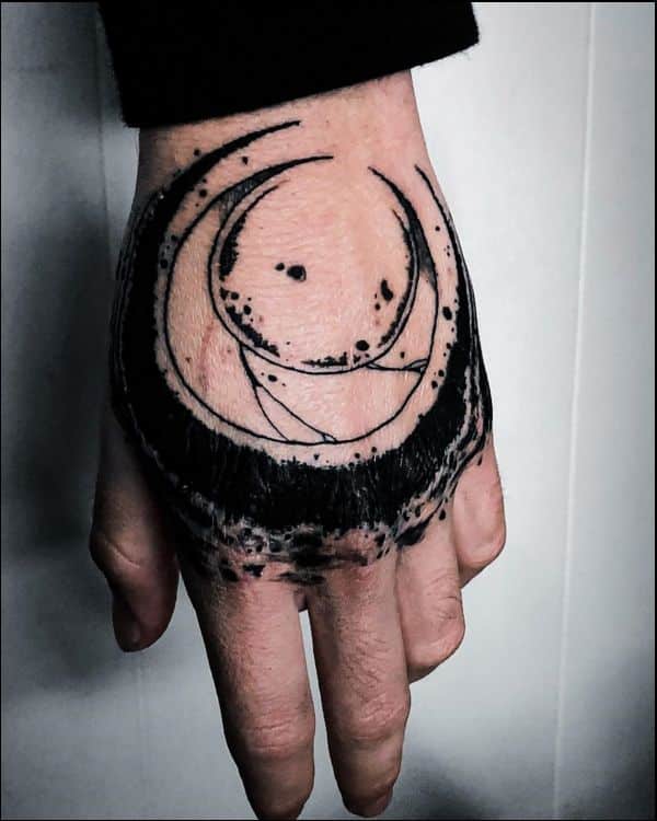 hand moon tattoo