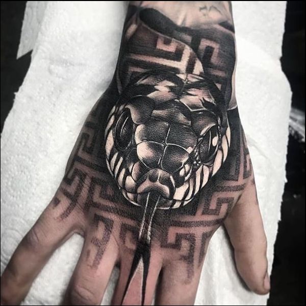 snake hand tattoos