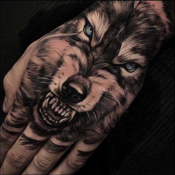 wolf hand tattoos