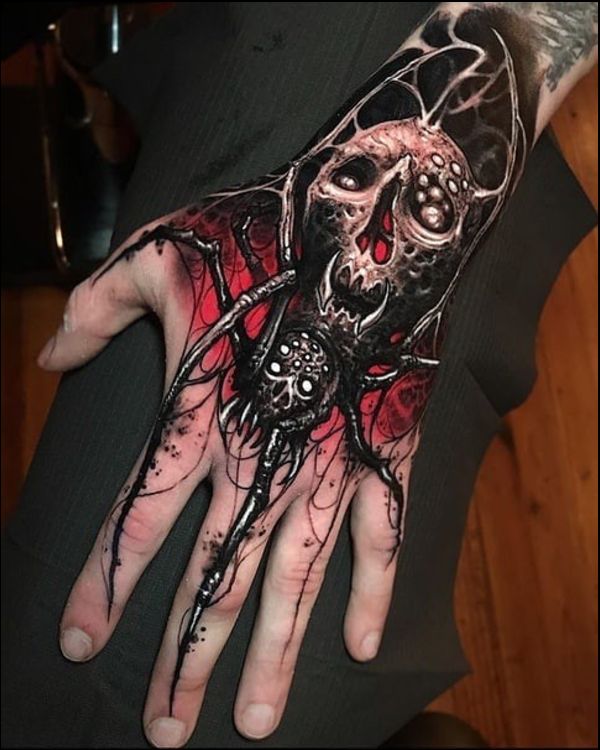 black widow spider tattoos on hand