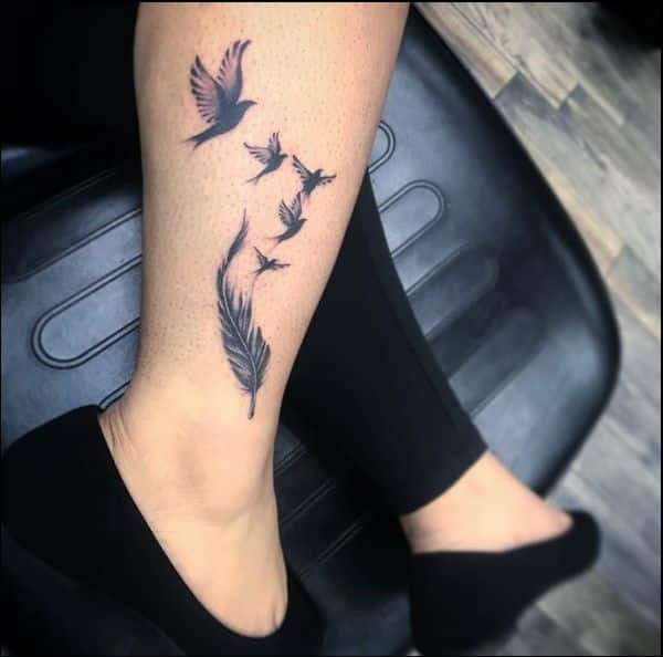 ankle tattoos bird and feather