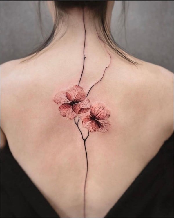 Anemone flower tattoo on back