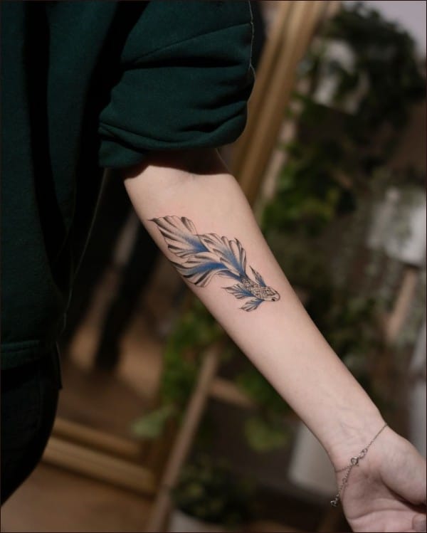 fish tattoos forearms