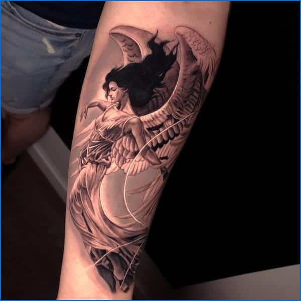 flying angel tattoos on arm