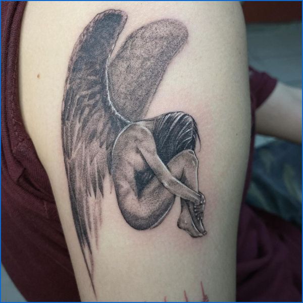 Sad angel tattoos