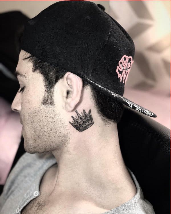crown tattoos behind the ear