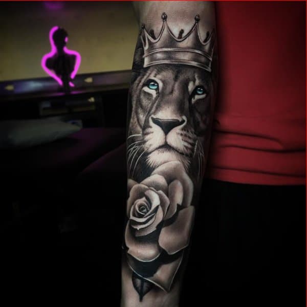 lion rose crown forearm tattoos