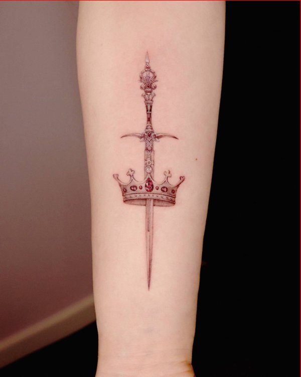 crown tattoo with sword