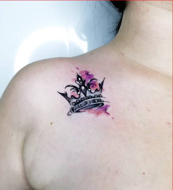 crown tattoo on shoulder