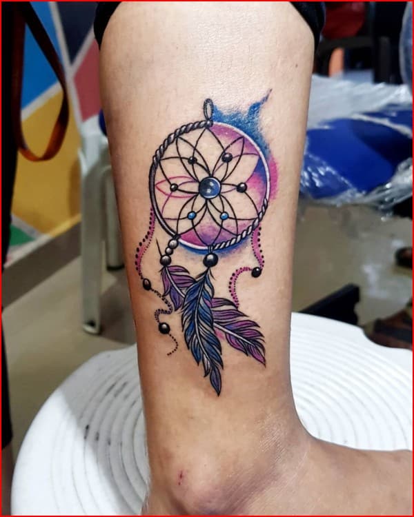 dreamcatcher feathers tattoo on leg