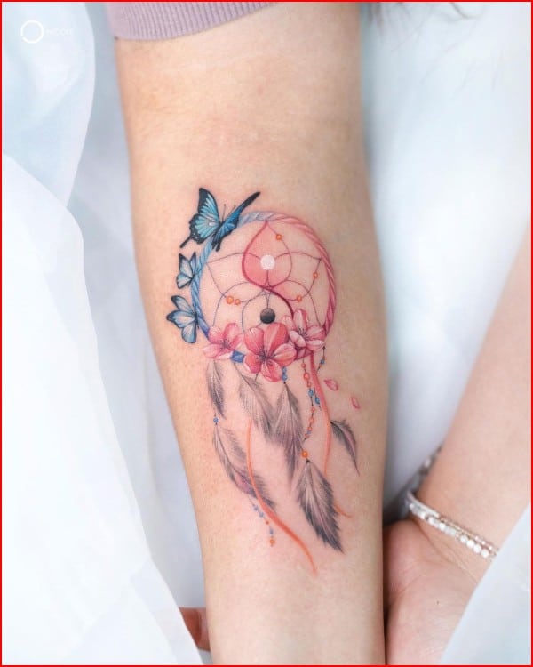 dreamcatcher feathers tattoo on arms