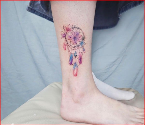 dreamcatcher foot tattoo