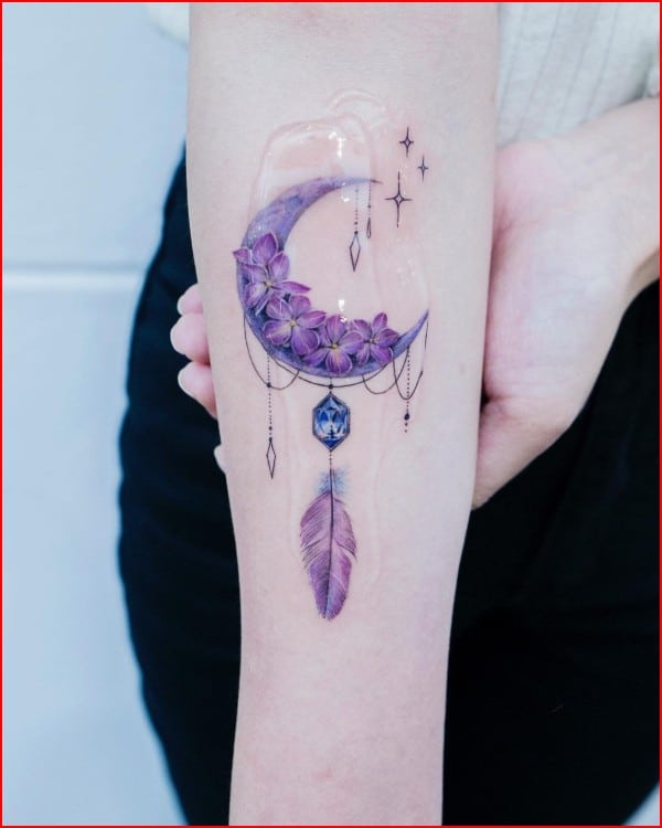 forearm dreamcatcher tattoo