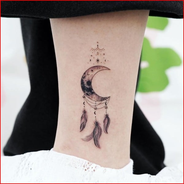 dreamcatcher tattoo on leg