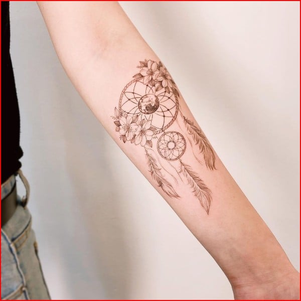 dreamcatcher tattoo on wrist