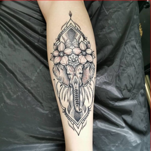 elephant tattoos forearm