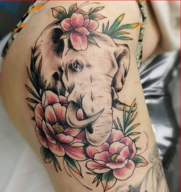 Aggregate 72 elephant tattoo with flowers latest  thtantai2