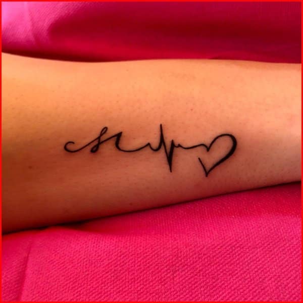 simple heart beat tattoos on arms for girls