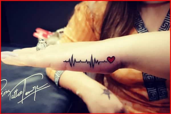 heartbeat tattoos on hand