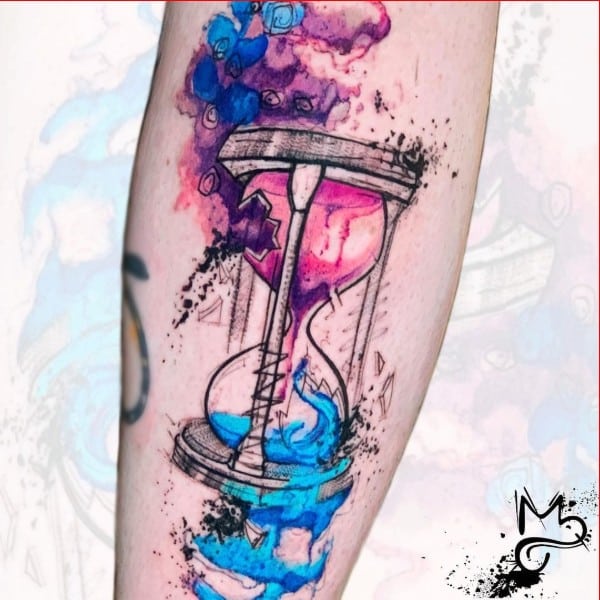 hourglass themed sleeve tattoo