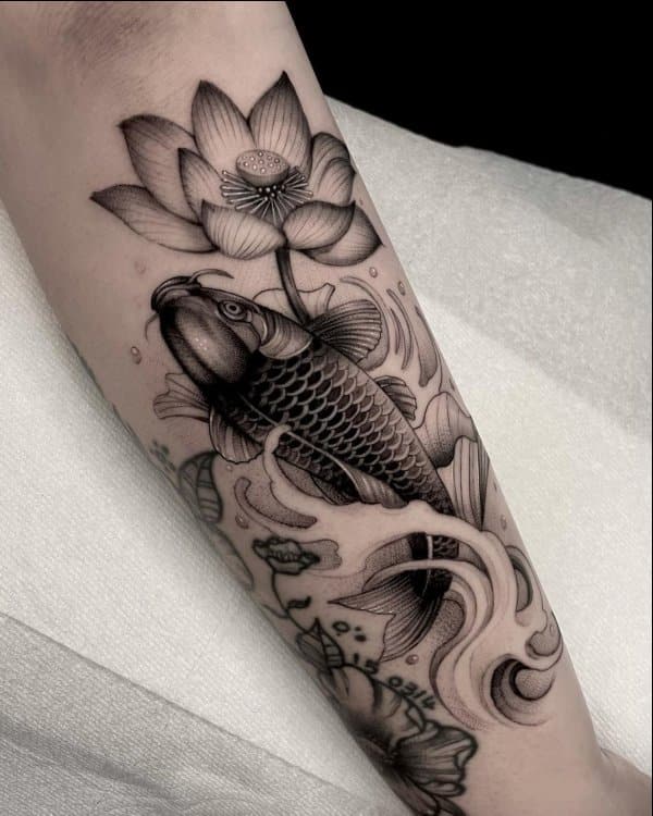 koi fish tattoo arm with lotus