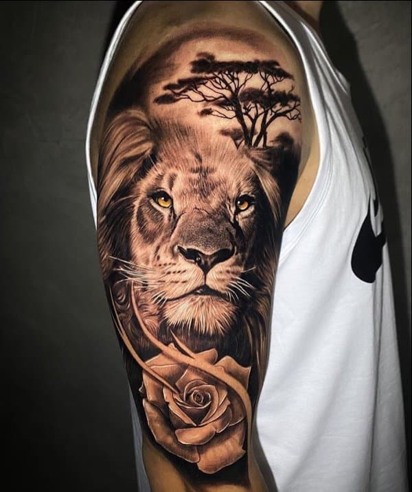 lion tattoo top of arm
